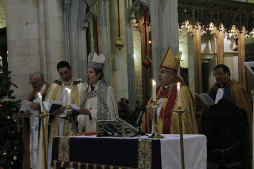 The Very Rev. Hosam Naoum, dean of the St. George’s Cathedral, Presiding Bishop Katharine Jefferts Schori and Anglican Bishop in Jerusalem Suheil S. Dawani, during Midnight Mass on Christmas Eve at the Cathedral Church of St. George the Martyr in Jerusalem. ENS Photo/Lynette Wilson