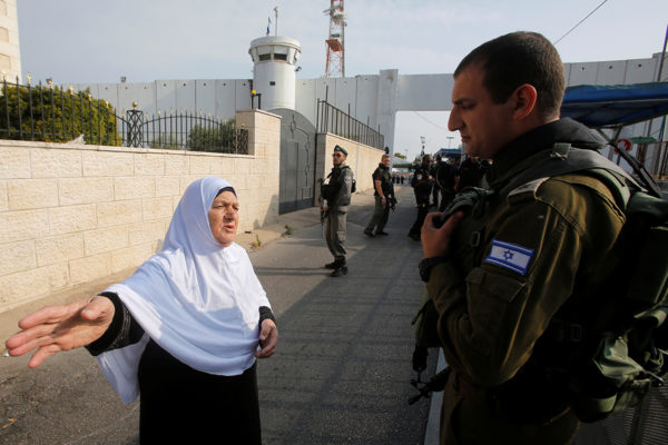 Palestinian woman at Israeli checkpoint